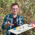 concepteur de jeux, jeune homme, matériel de jeux, nature, protection de l'environnement